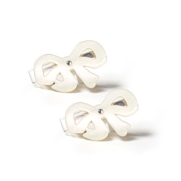 Pair of metal based hair clips adorned with cream pearlized bows