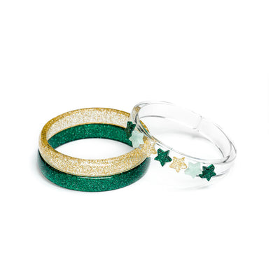Set of three acrylic bracelets. One is gold glitter, one is green glitter and one is clear adorned with seven glitter stars in gold and green. 