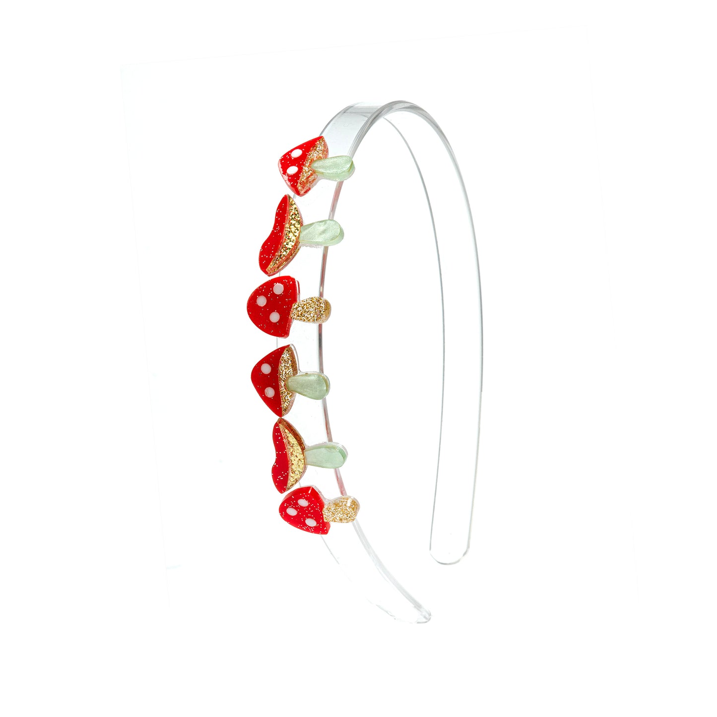 Clear headband adorned with 6 red and gold glitter mushrooms.