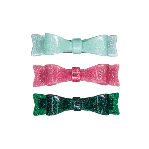 Set of three acrylic bow hair clips, in green, mint and pink glitter.