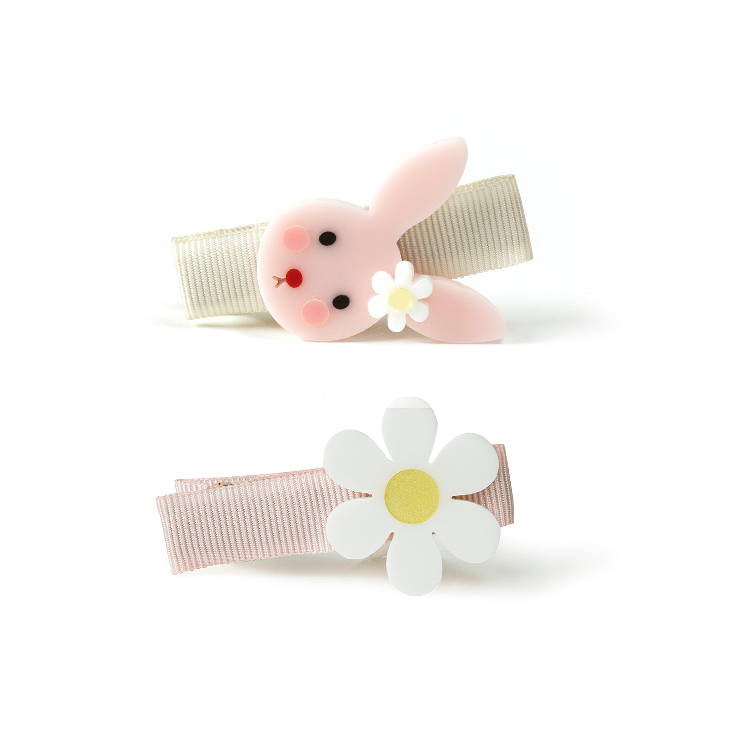 Pair of hair clips. One has a cute light pink bunny face with a daisy on one of his ear. The second one is adorned with a daisy. 