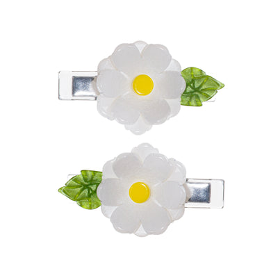 Pair of metal based hair clips each adorned with a white and yellow acrylic peony like flower and a green leaf.