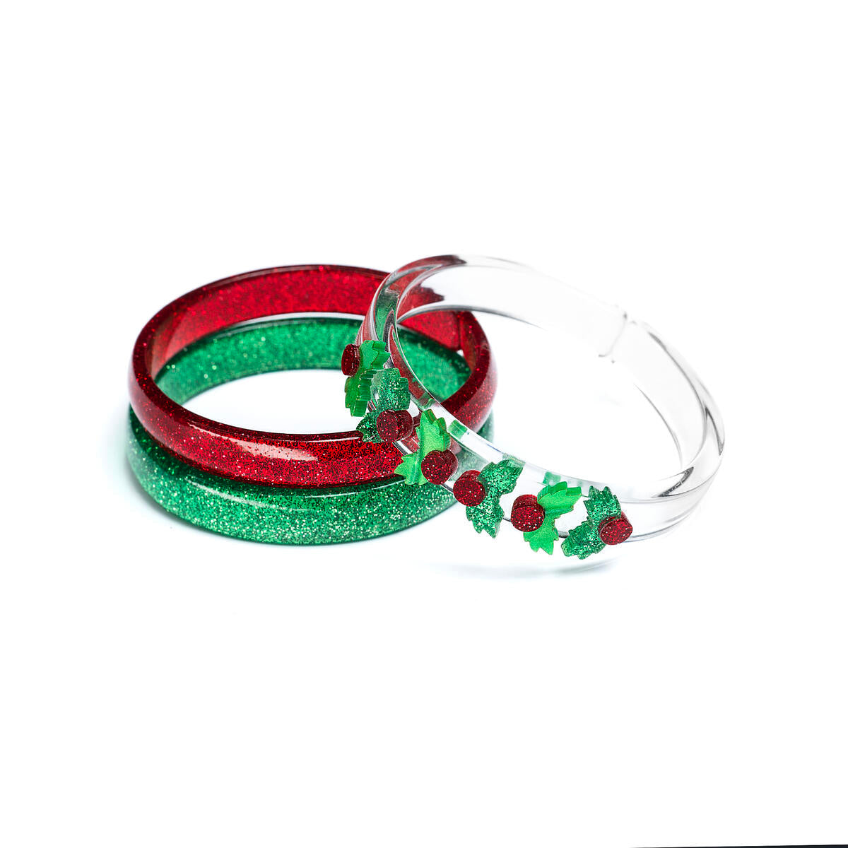 Acrylic set of three bracelets. One is red glitter, one is green glitter and one is clear adorned with six mistletoe in red and green glitter. 