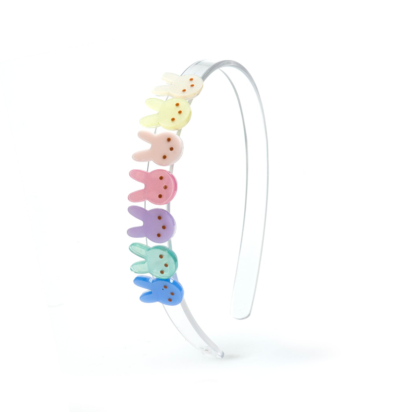 Clear acrylic headband adorned with seven colorful pastel shades bunny faces.