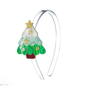 Clear acrylic headband adorned with a green pearly Christmas tree with gold glitter decorations on the side.