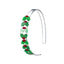 Clear acrylic headband with eight small mistletoe charms in different shades of glittery green and red glitter detail.