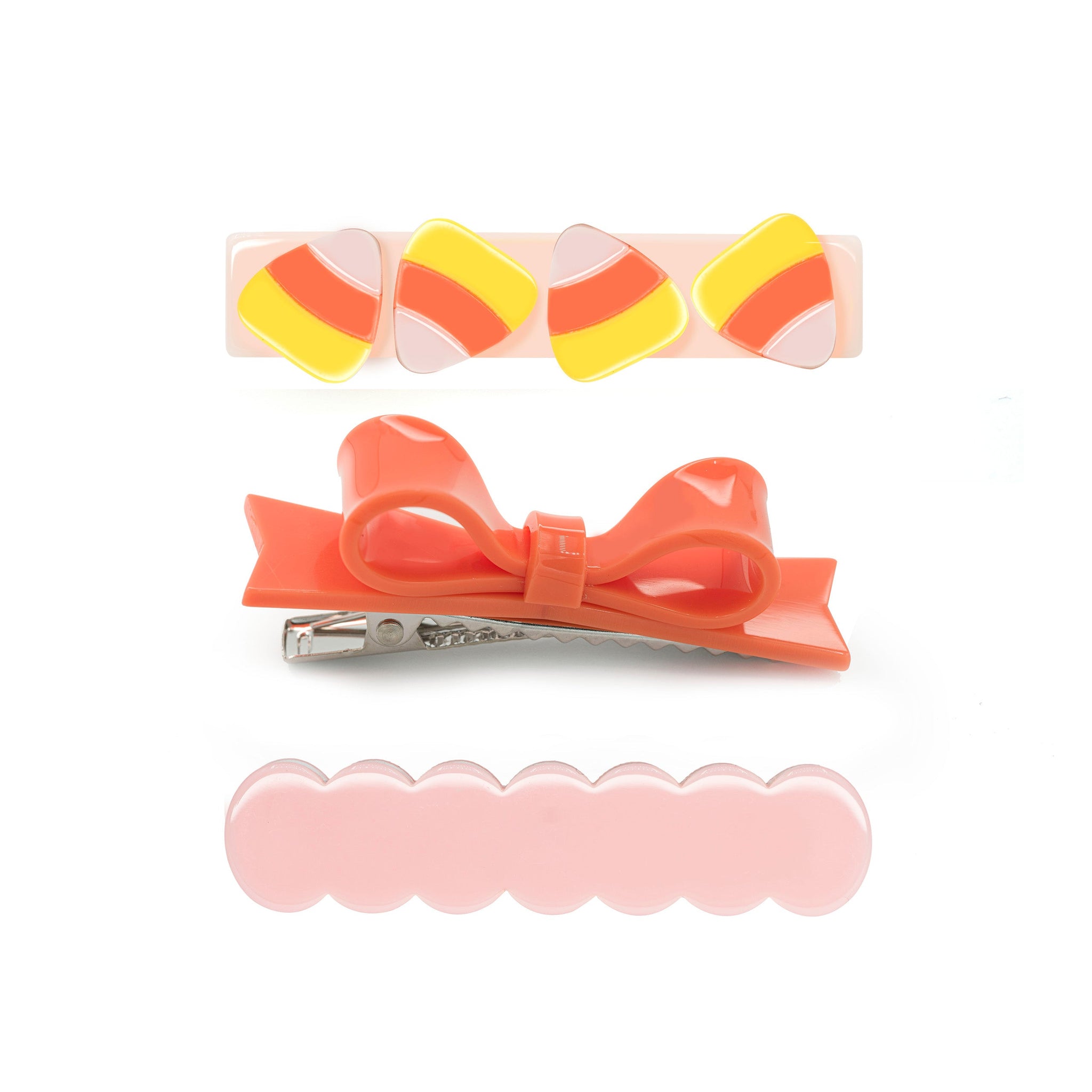 3 piece hair clips - 1 candy corn, 1 coral bow and 1 wavy cutout