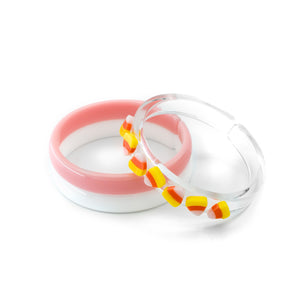 3 piece acrylic bracelets - 1 white, 1 light pink and 1 with candy corn charms